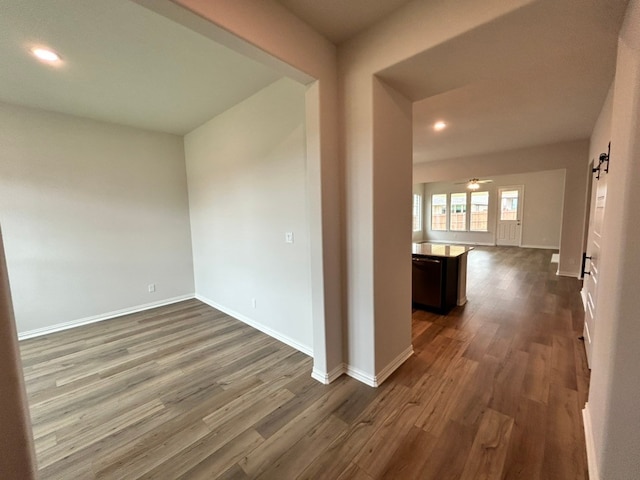 3515 Columbus St, Gainesville, TX 76240 - unfurnished room featuring dark wood-type flooring, baseboards, recessed lighting, and ceiling fan