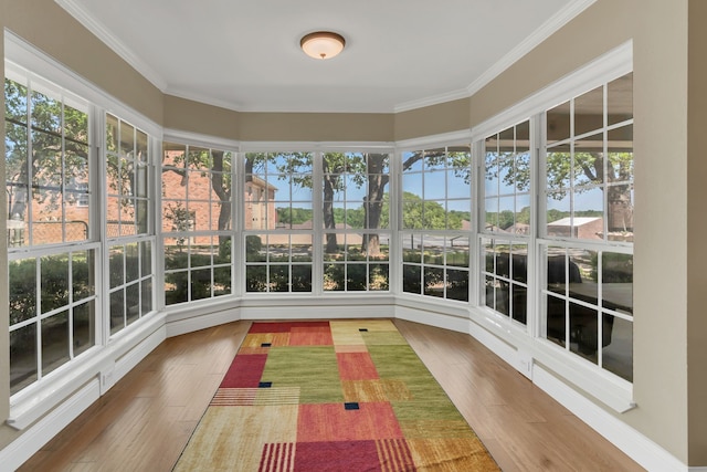 327 Saddle Club Rd, Weatherford, TX 76088 - unfurnished sunroom featuring wood finished floors and crown molding