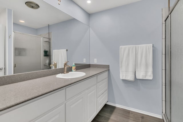 327 Saddle Club Rd, Weatherford, TX 76088 - full bath with recessed lighting, a shower stall, wood finished floors, vanity, and baseboards