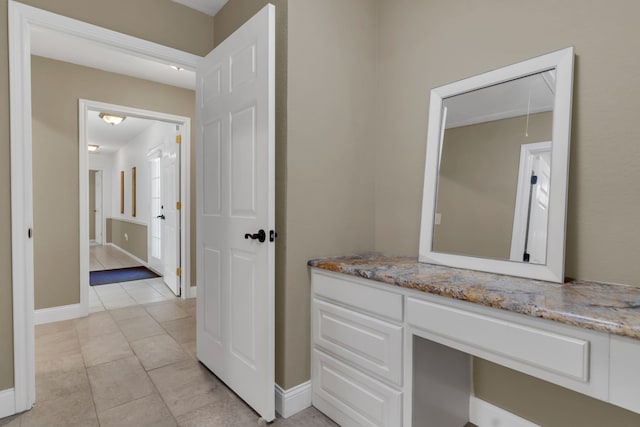 327 Saddle Club Rd, Weatherford, TX 76088 - bathroom featuring baseboards and tile patterned flooring