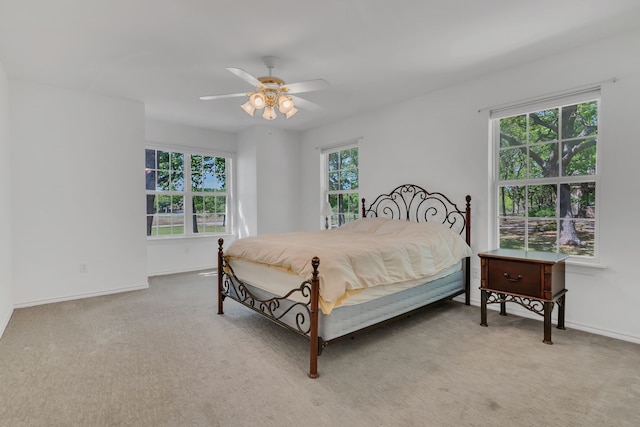 327 Saddle Club Rd, Weatherford, TX 76088 - bedroom with a ceiling fan, baseboards, and light colored carpet