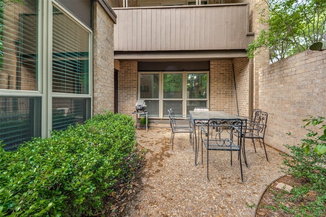 view of patio with outdoor dining area