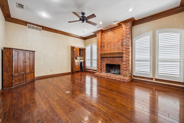 845 Canyon Crest Dr, Irving, TX 75063 - unfurnished living room featuring dark wood-type flooring, visible vents, crown molding, and ceiling fan