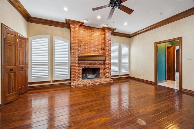 845 Canyon Crest Dr, Irving, TX 75063 - unfurnished living room featuring ornamental molding, wood-type flooring, baseboards, a fireplace, and ceiling fan