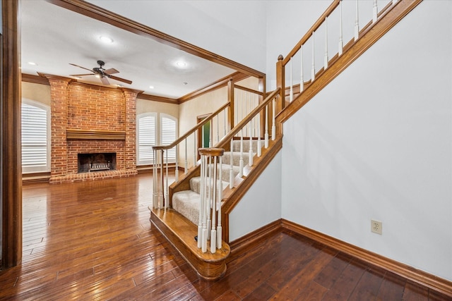 845 Canyon Crest Dr, Irving, TX 75063 - stairway featuring hardwood / wood-style flooring, a ceiling fan, baseboards, and ornamental molding