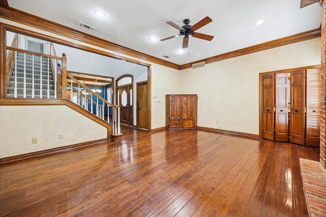 845 Canyon Crest Dr, Irving, TX 75063 - unfurnished living room featuring ceiling fan, visible vents, stairway, and crown molding