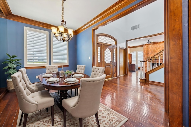 845 Canyon Crest Dr, Irving, TX 75063 - dining area featuring stairs, ornamental molding, a chandelier, and visible vents