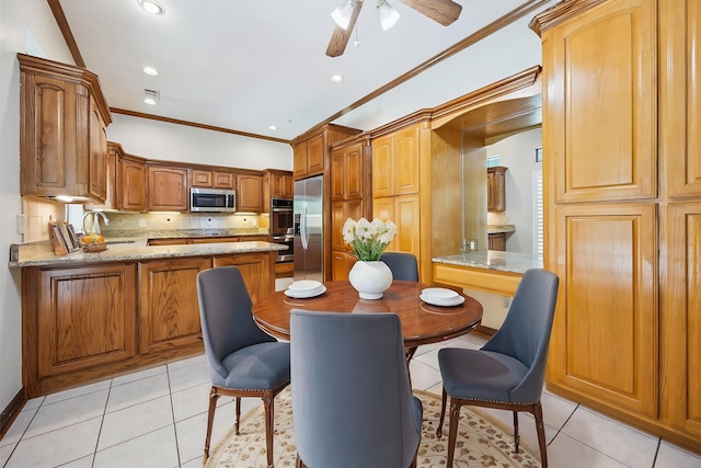 845 Canyon Crest Dr, Irving, TX 75063 - dining room featuring light tile patterned floors, recessed lighting, and ornamental molding