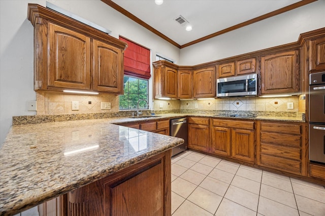 845 Canyon Crest Dr, Irving, TX 75063 - kitchen featuring stainless steel appliances, a sink, light tile patterned flooring, visible vents, and ornamental molding