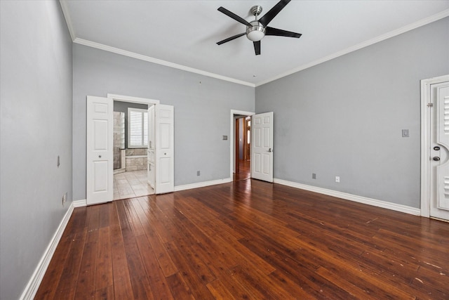 845 Canyon Crest Dr, Irving, TX 75063 - unfurnished bedroom featuring baseboards, ceiling fan, crown molding, hardwood / wood-style floors, and ensuite bath