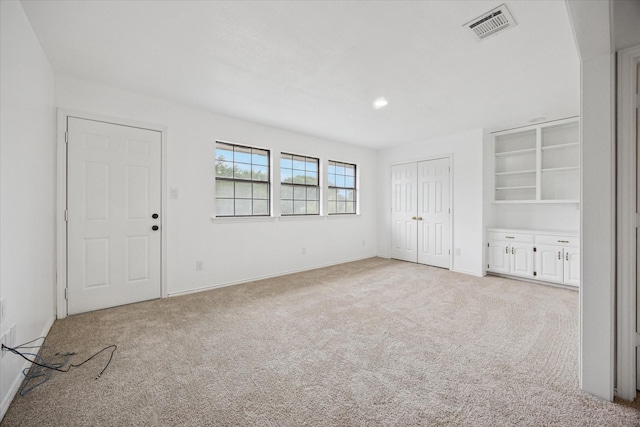 845 Canyon Crest Dr, Irving, TX 75063 - interior space with recessed lighting, light carpet, visible vents, and baseboards