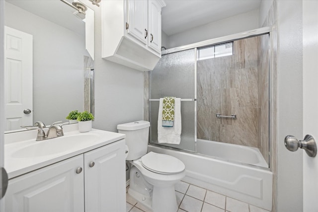 845 Canyon Crest Dr, Irving, TX 75063 - bathroom with bath / shower combo with glass door, tile patterned flooring, vanity, and toilet