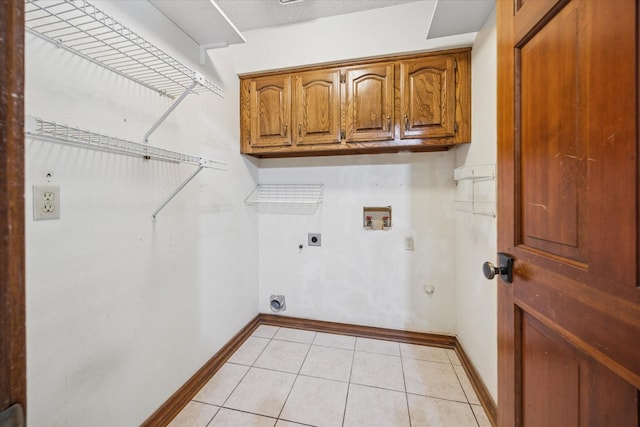 845 Canyon Crest Dr, Irving, TX 75063 - laundry area with electric dryer hookup, cabinet space, hookup for a washing machine, and baseboards