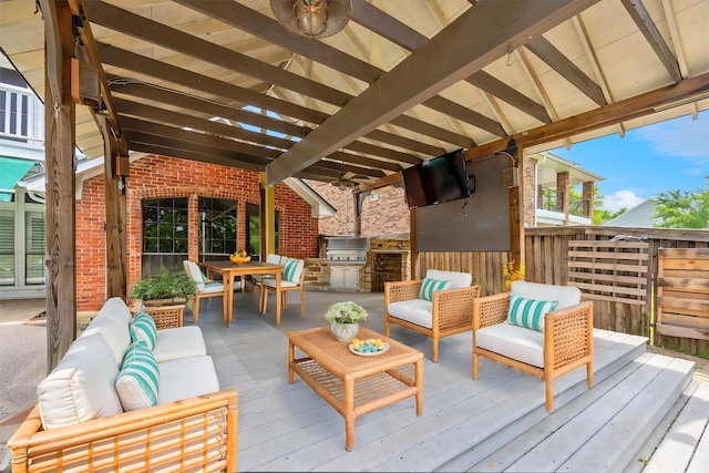 845 Canyon Crest Dr, Irving, TX 75063 - view of patio featuring exterior kitchen, an outdoor hangout area, outdoor dining area, and area for grilling