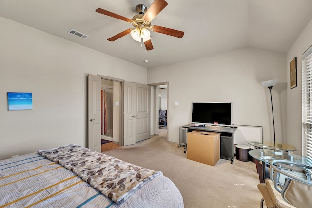 bedroom with light carpet, a ceiling fan, vaulted ceiling, and visible vents