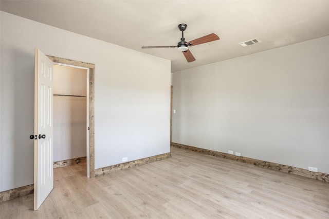 1754 County Road 427, Muenster, TX 76252 - unfurnished bedroom featuring light wood-style flooring, baseboards, visible vents, a ceiling fan, and a closet