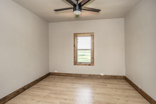 1754 County Road 427, Muenster, TX 76252 - empty room with light wood-style floors, baseboards, and ceiling fan