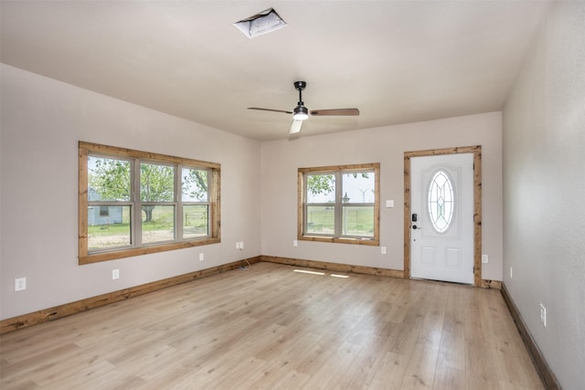 1754 County Road 427, Muenster, TX 76252 - entryway featuring a wealth of natural light, a ceiling fan, light wood-style floors, and baseboards
