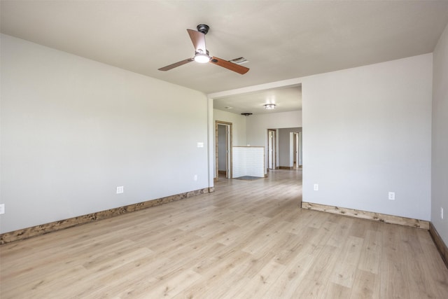 1754 County Road 427, Muenster, TX 76252 - empty room with baseboards, wood finished floors, and ceiling fan