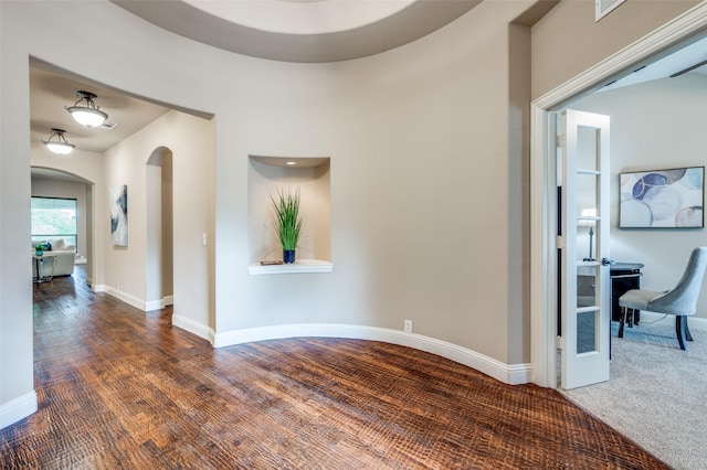 11529 Penick Way, Frisco, TX 75033 - hallway featuring arched walkways and baseboards