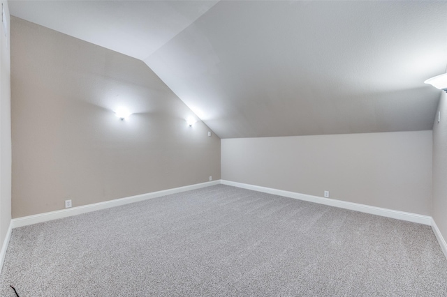 11529 Penick Way, Frisco, TX 75033 - additional living space with lofted ceiling, carpet, and baseboards
