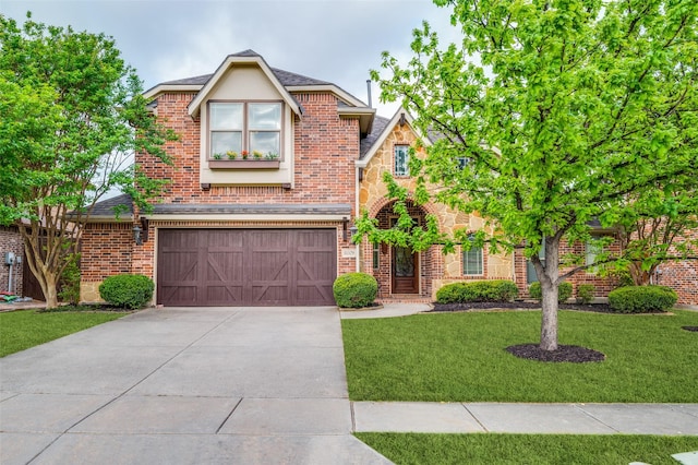 11529 Penick Way, Frisco, TX 75033 - view of front of house featuring an attached garage, concrete driveway, brick siding, a front yard, and a shingled roof