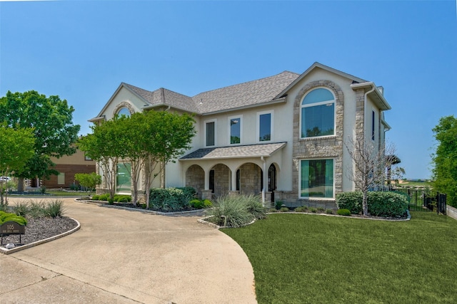 105 Bay Hill Dr, Graford, TX 76449 - traditional-style house with stone siding, stucco siding, and a porch