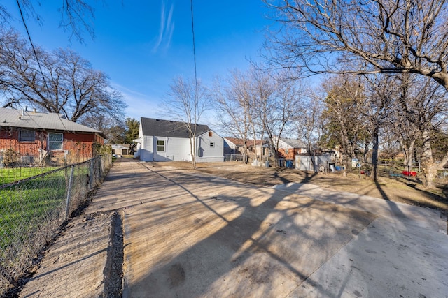 1826 Norfolk Ave, Dallas, TX 75203 - back of property featuring fence and a residential view
