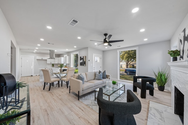 1826 Norfolk Ave, Dallas, TX 75203 - living room featuring recessed lighting, a premium fireplace, visible vents, and ceiling fan