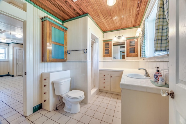 1182 County Road 3025, Bonham, TX 75418 - full bath featuring tile patterned floors, toilet, a shower with shower curtain, wood ceiling, and vanity