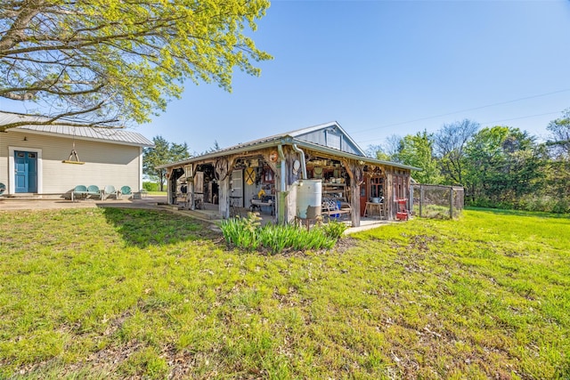1182 County Road 3025, Bonham, TX 75418 - rear view of property featuring a yard