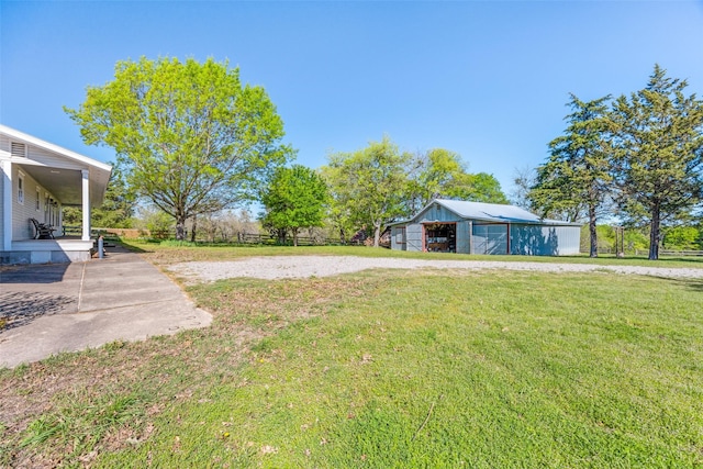1182 County Road 3025, Bonham, TX 75418 - view of yard with an outbuilding and an outdoor structure