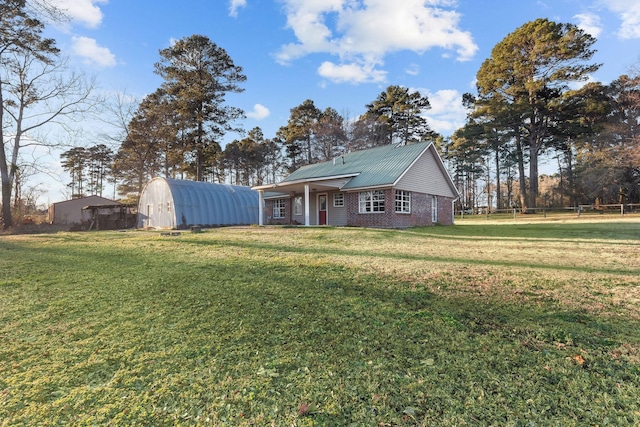 5663 Bretwood Dr, Keithville, LA 71047 - exterior space with a front lawn, fence, an outbuilding, and metal roof