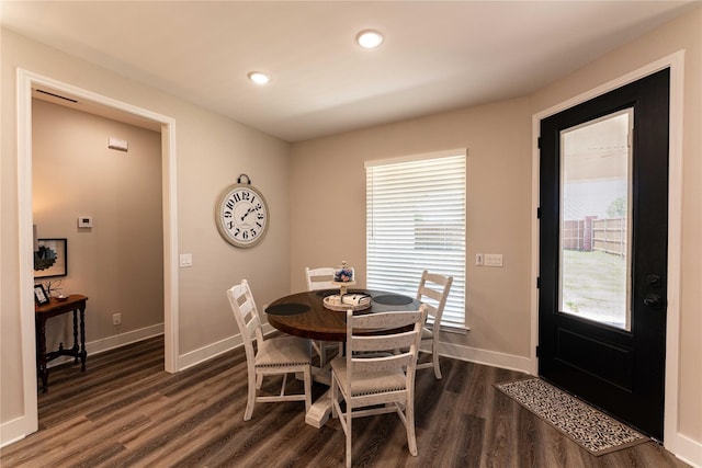 dining area with recessed lighting, baseboards, and dark wood-style flooring