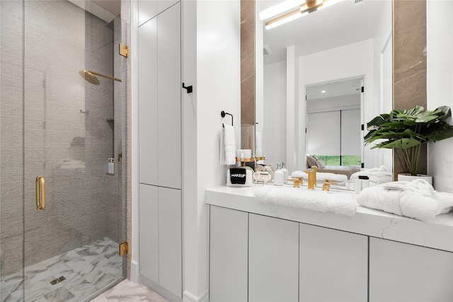 1124 Paradise Cv, Streetman, TX 75859 - ensuite bathroom featuring vanity, ensuite bathroom, marble finish floor, and a shower stall