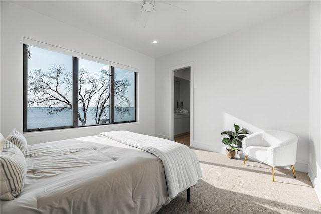1124 Paradise Cv, Streetman, TX 75859 - carpeted bedroom with ceiling fan and baseboards