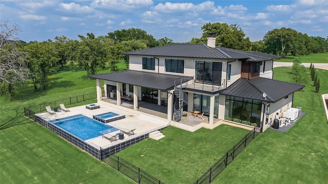 1124 Paradise Cv, Streetman, TX 75859 - back of property with a fenced backyard, a standing seam roof, and metal roof