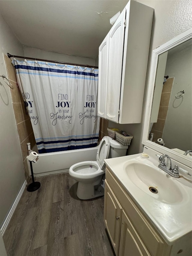704 N Tennessee St, Mckinney, TX 75069 - bathroom featuring wood finished floors, shower / tub combo, toilet, and vanity