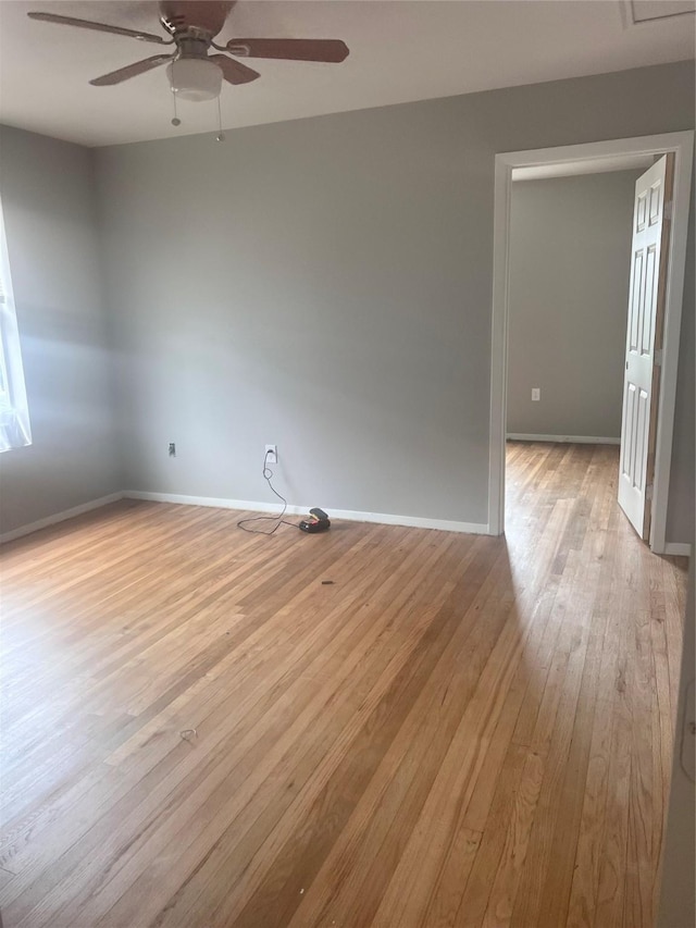 704 N Tennessee St, Mckinney, TX 75069 - spare room featuring light wood-style floors, a ceiling fan, and baseboards