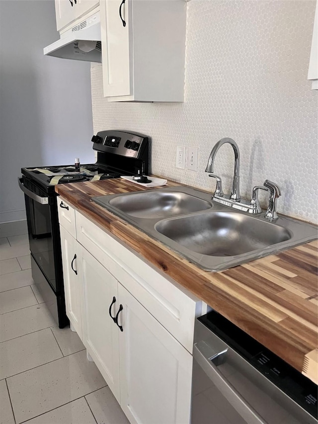708 N Tennessee St, Mckinney, TX 75069 - kitchen with wood counters, electric range, under cabinet range hood, dishwasher, and white cabinetry