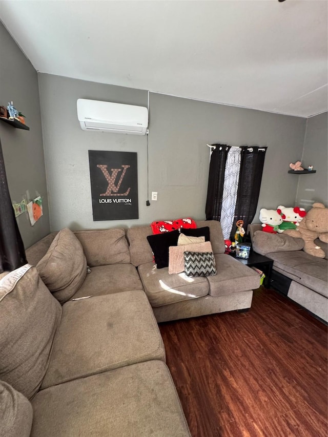 708 N Tennessee St, Mckinney, TX 75069 - living room featuring an AC wall unit and wood finished floors