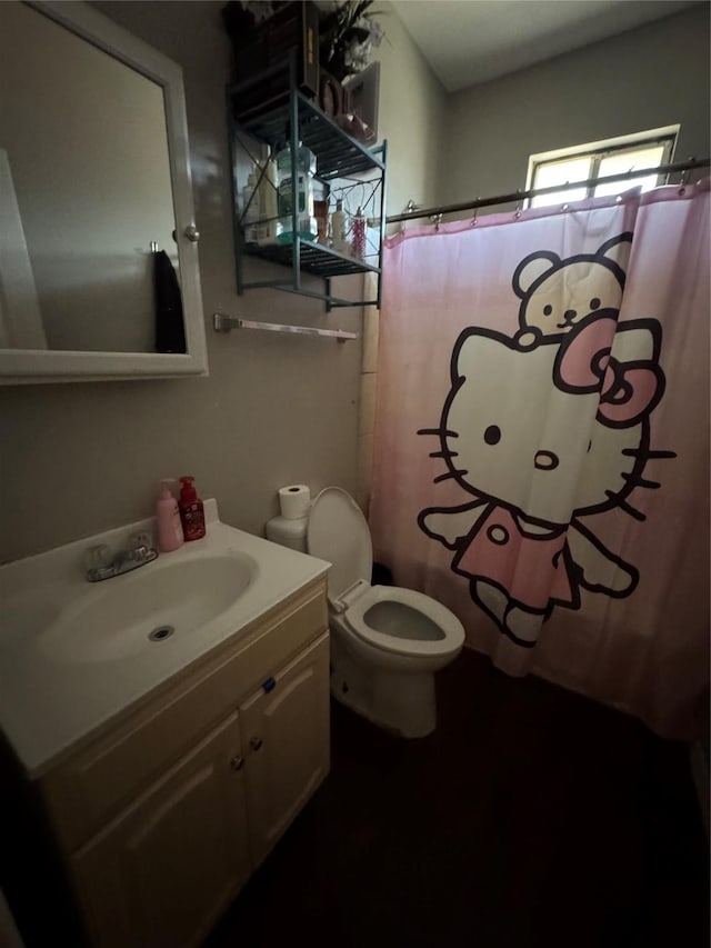 708 N Tennessee St, Mckinney, TX 75069 - bathroom featuring vanity, toilet, a shower with curtain, and wood finished floors