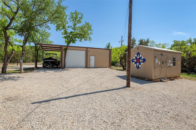 1780 S Lakeview Dr, Gordon, TX 76453 - garage with a detached garage and gravel driveway