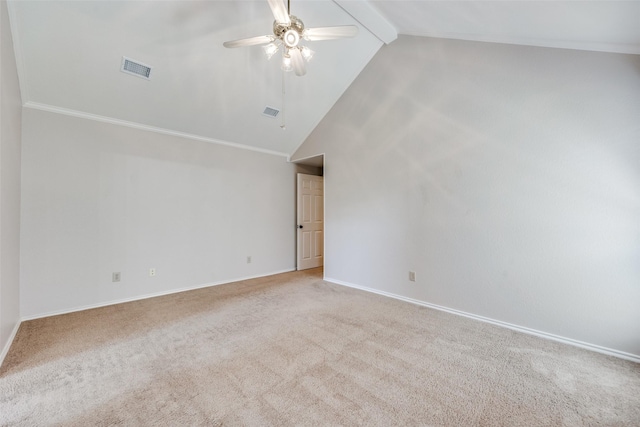carpeted spare room featuring a ceiling fan and baseboards