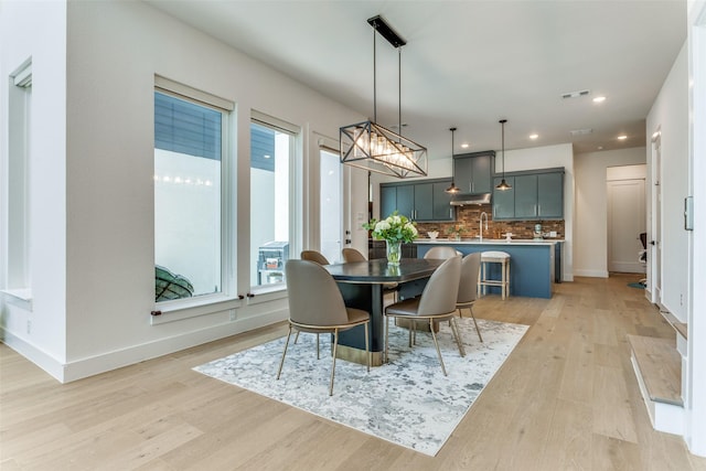 7320 Collin Mckinney Pkwy, Mckinney, TX 75070 - dining space with light wood-type flooring, baseboards, recessed lighting, and visible vents