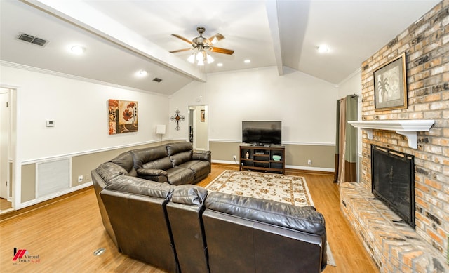 3873 Talton St, Shreveport, LA 71119 - living area featuring lofted ceiling with beams, a ceiling fan, visible vents, and light wood-type flooring