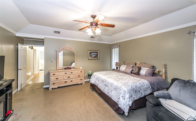 3873 Talton St, Shreveport, LA 71119 - bedroom featuring a ceiling fan, a tray ceiling, light colored carpet, ornamental molding, and visible vents