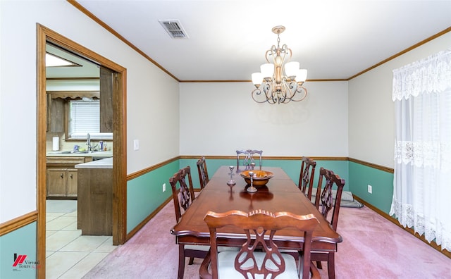 3873 Talton St, Shreveport, LA 71119 - dining space featuring baseboards, visible vents, an inviting chandelier, and ornamental molding