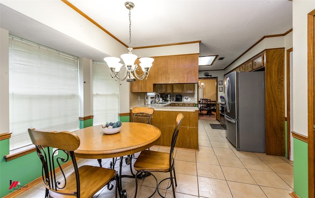 3873 Talton St, Shreveport, LA 71119 - dining space featuring visible vents, crown molding, light tile patterned floors, and an inviting chandelier