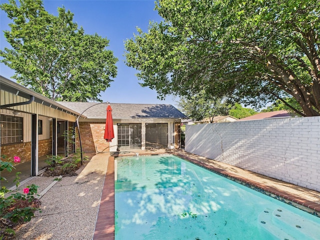 view of pool featuring a fenced backyard and a fenced in pool